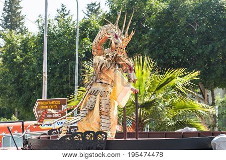 LIMASSOL, CYPRUS - FEBRUARY 26: Carnivalists in a silver cylinder hats joyfully follow the Limassol Municipality Band during the annual Carnival Parade, February 26, 2017 in Limassol.