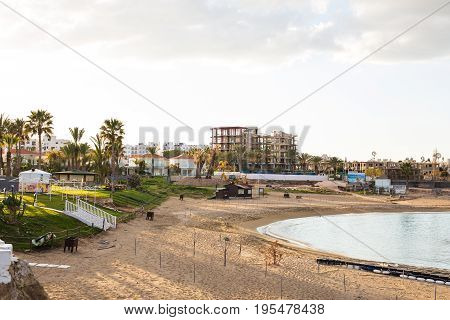 Protaras, Cyprus - February, 15, 2017. Construction's cars working on the construction of a new hotel in Protaras. Urban scene