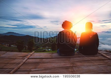 Lover Men and women Asia travel relax. Morning atmosphere nature Forests mountains. Phu Thap Buek Thailand