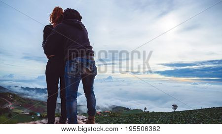 Lover Men and women Asia travel relax. Morning atmosphere nature Forests mountains. Phu Thap Buek Thailand