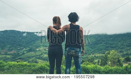 Lover Men and women Asia travel relax. Morning atmosphere nature Forests mountains. khaoko Thailand