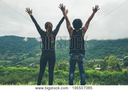 Lover Men and women Asia travel relax. Morning atmosphere nature Forests mountains. khaoko Thailand