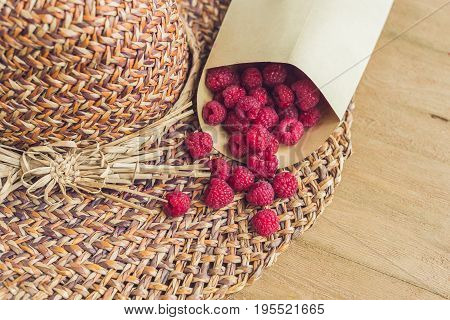 Summer Holiday, Vacation, Relaxation Concept. Raspberries, Straw Hat. Free Text Copy Space. Summer V