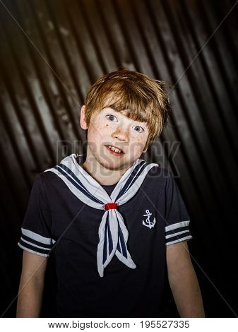 Schoolboy Posing In Sailor Costume With Emotions