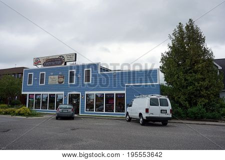 MACKINAW CITY, MICHIGAN / UNITED STATES - JUNE 18, 2017: One may buy candy at Devon's Mackinac Island Candy Factory, in downtown Mackinaw City.
