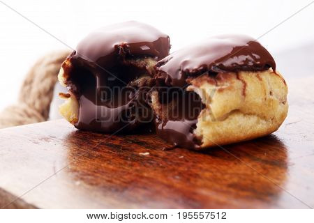Traditional French Dessert. Eclair With Chocolate Icing. Pastery Concept