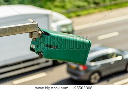 Day view of average speed traffic camera over UK Motorway.