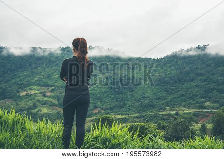 Asian women travel sleep relax. Morning atmosphere nature Forests mountains. khaoko Thailand