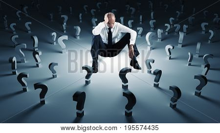 Worried businessman with many work questions unanswered. Concept of failure and problem