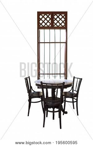 Wooden round table and chair chiness style near window isolated on white background