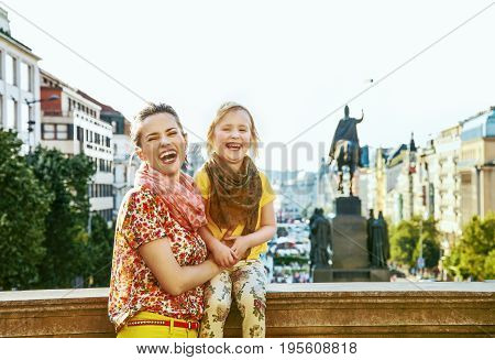 Happy Mother And Daughter Tourists In Prague Czech Republic