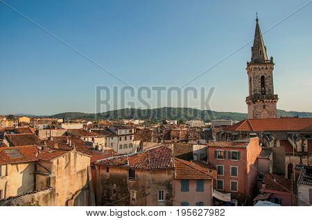 View of the lively and gracious town of Draguignan from the hill of the clock tower, under the colorful light of the sunset. Located in the Var department, Provence region, southeastern France