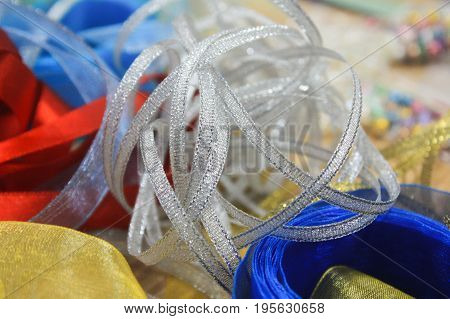Decorations for New Year hand made. Colorful tape, ribbon, lace, band, webbing, string for decoration on the table. Decorations for the celebration, party, holiday, wedding. Hand made for design, decor