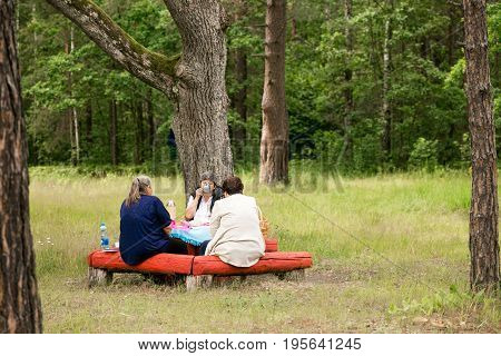 TOURS BELARUS - JULY 15 2017: A place to rest at the road. Women are having dinner