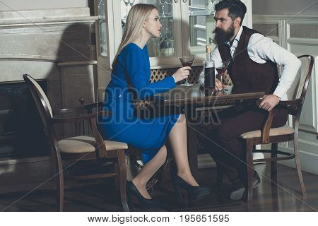 Couple In Love Drinking Red Wine In Restaurant