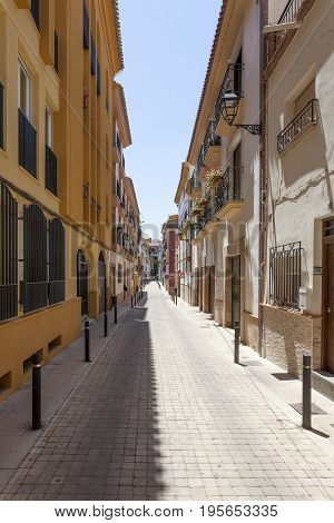 Narrow street in the old town of Lorca. Murcia province southern Spain