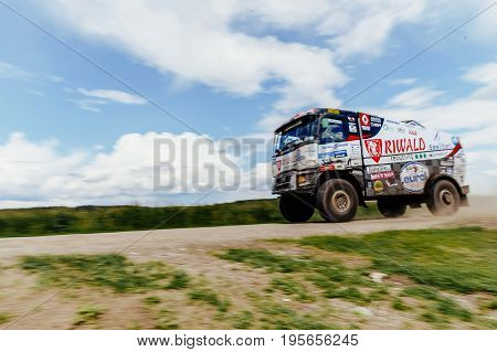 Filimonovo Russia - July 10 2017: blurred motion truck rally car Renault driving blue sky over him during Silk way rally