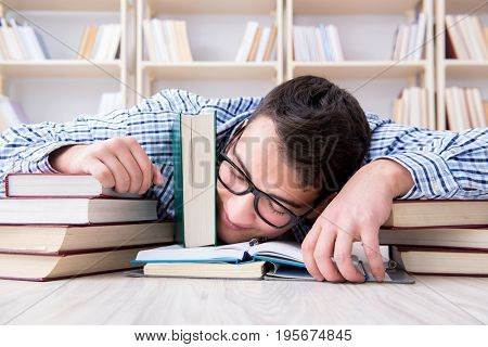 Young student studying with books