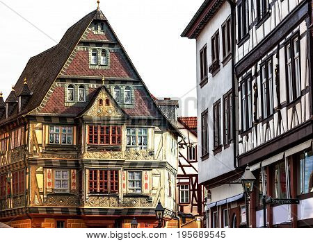 Historic medieval houses in picturesque little town Miltenberg, by the Odenwald forest and the river Main, Germany