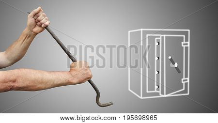 The hands with the crowbar break open the safe on a grey background