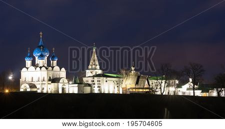 Suzdal, Russia. Nativity Cathedral, the bell tower and Archbishop's chambers of Suzdal Kremlin at night in summer