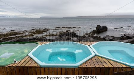 The hot natural pools in Drangsnes are right along the shoreline in the middle of the village