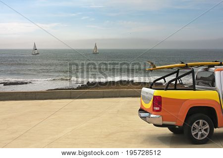 Surfer van in the Carcavelos beach in Lisbon Portugal