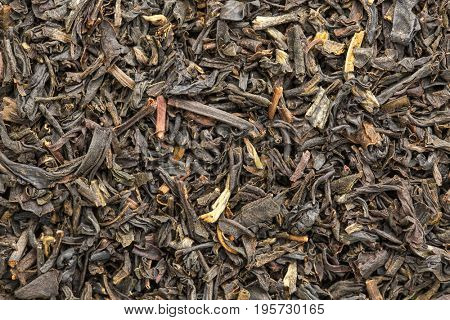 texture of Chinese oolong black tea, macro image of loose leaves