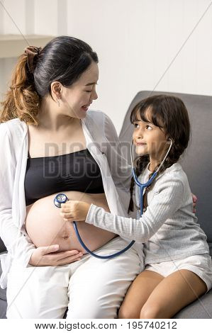 Little Cute Girl Using Stethoscope Check Stomach Her Mother
