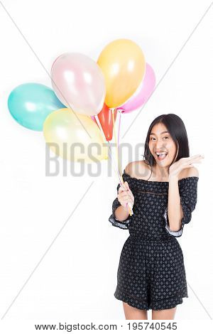 Young Beautiful Asian Woman Holding Colorful Balloon With Happy Emotion And Fun Isolated On White Ba