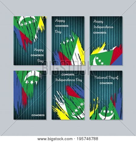 Comoros Patriotic Cards For National Day. Expressive Brush Stroke In National Flag Colors On Dark St