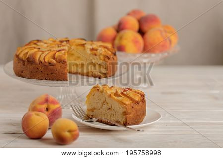 Homemade delicious aromatic peach pie. Selective focus.