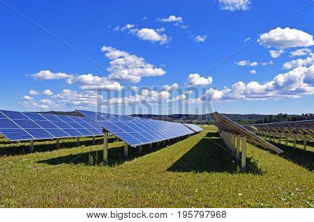 Rows of solar panels. Beautiful sky on background.