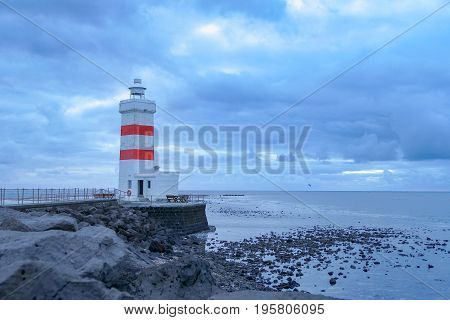White Lighthouse In Gardur Iin Iceland