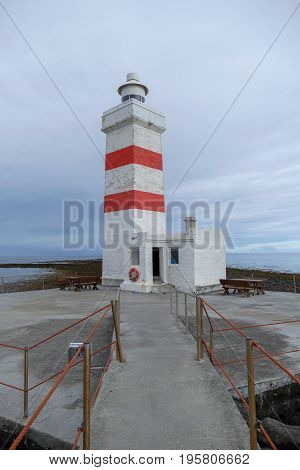 White Lighthouse In Gardur Iin Iceland