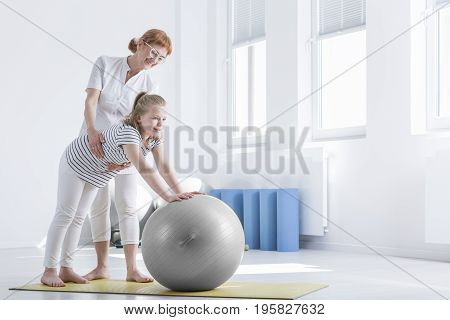 Girl With Bad Posture Exercising