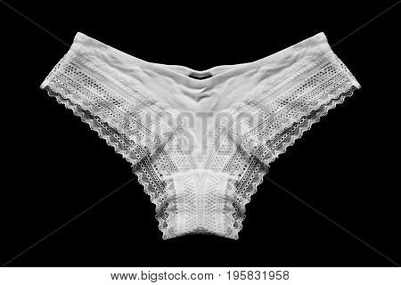 White lacy sexy panties isolated over black