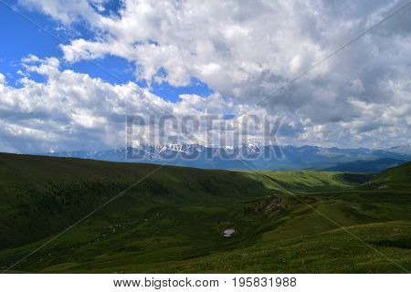 Green hills of Altai mountains and North-Chuyski ridge. Altay Region Siberia Russia.