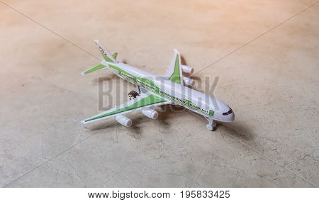 White platoon plane on cement floor, plane