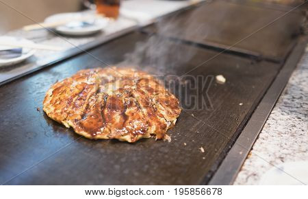 Fresh Cooking okonomiyaki in Tokyo - japan