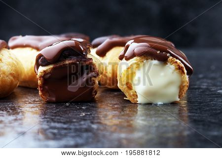 Traditional French Dessert. Eclair With Chocolate Icing. Pastery Concept