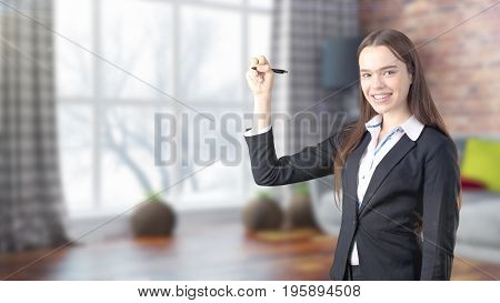Young Beautiful Business Woman And Creative Designer Standing Over Blured Interior Background