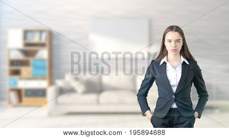 Young Beautiful Business Woman And Creative Designer Standing Over Blured Interior Background