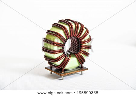 Transformer copper coil isolated on a white background