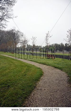 bench and water in the park with trees France