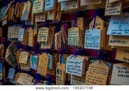 HAKONE, JAPAN - JULY 02, 2017: EMA at Kiyomizu-dera Temple. EMA are small wooden plaques on which Shinto worshippers write their prayers or wishes.