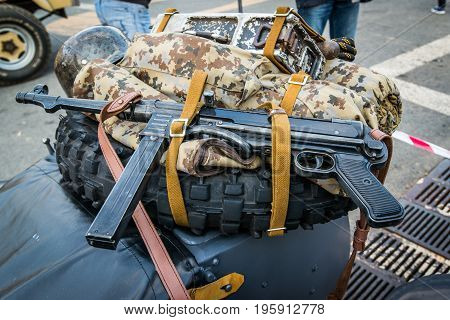 German submachine gun MP40 tied to a motorcycle sidecar.