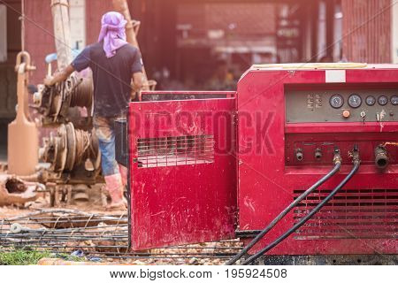 Worker Installing Wet-process Bored Pile For Outside Public Construction