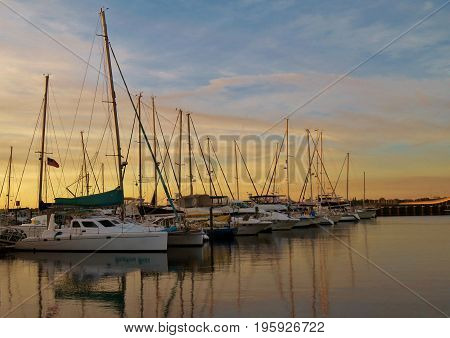 Sailbooats In A Harbor In Bradenton, Florida At Sunset