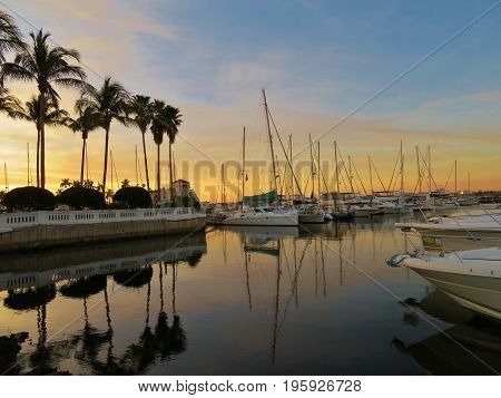Sailbooats In A Harbor In Bradenton, Florida At Sunset